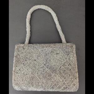 Caché Silver Beaded Clutch